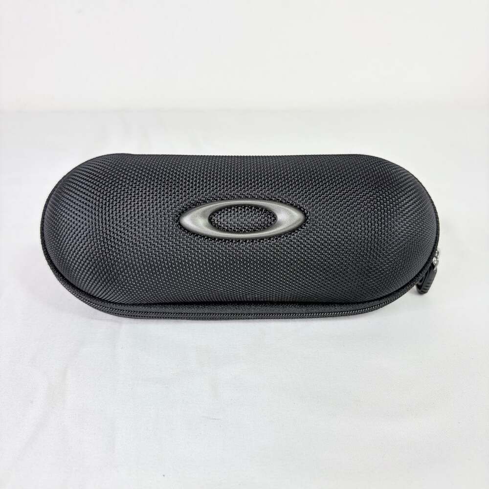 Oakley cylinder eyeglasses case in black with logo, protective, travel, work.